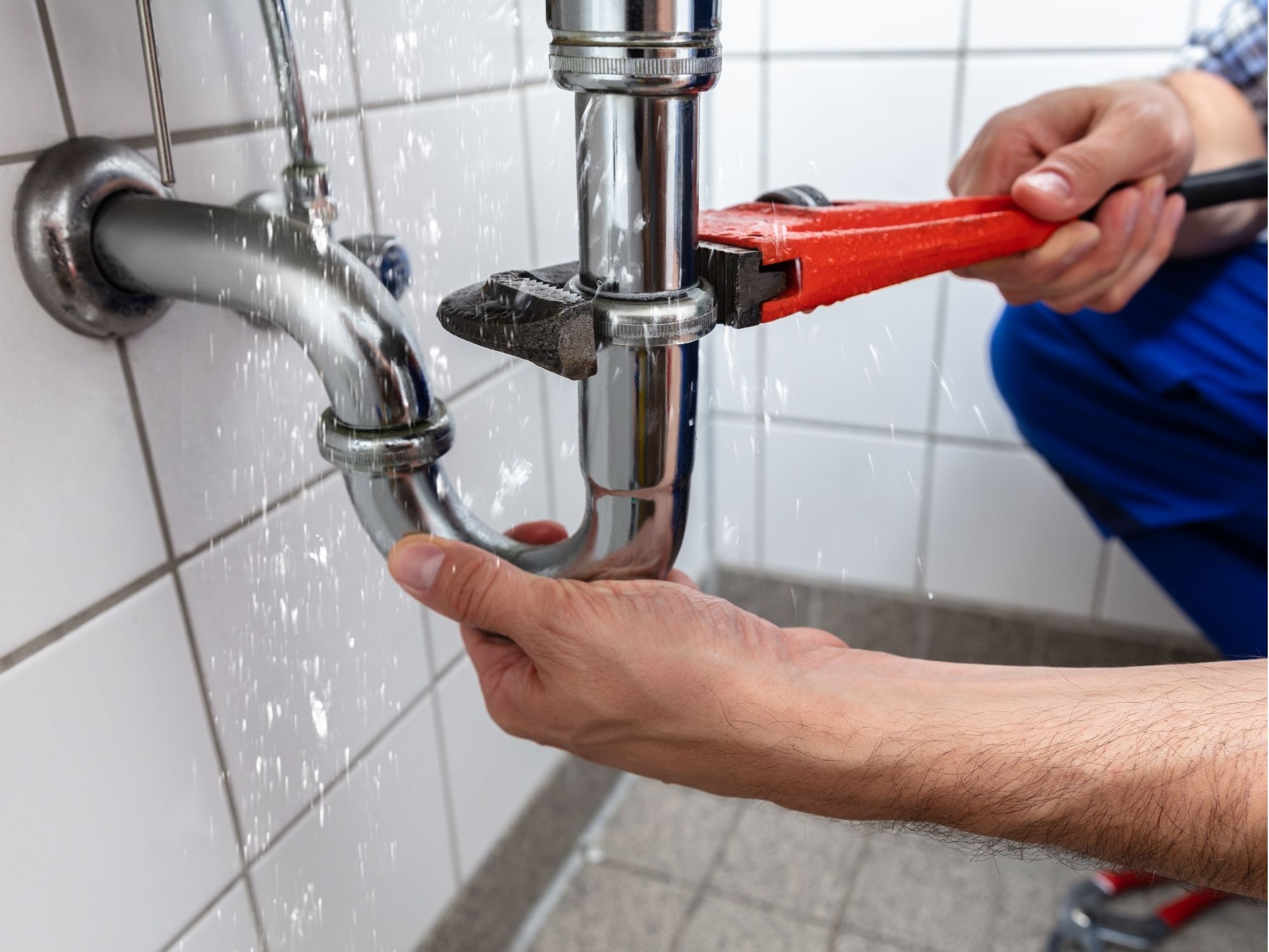 Emergency plumber working on an urgent residential plumbing repair