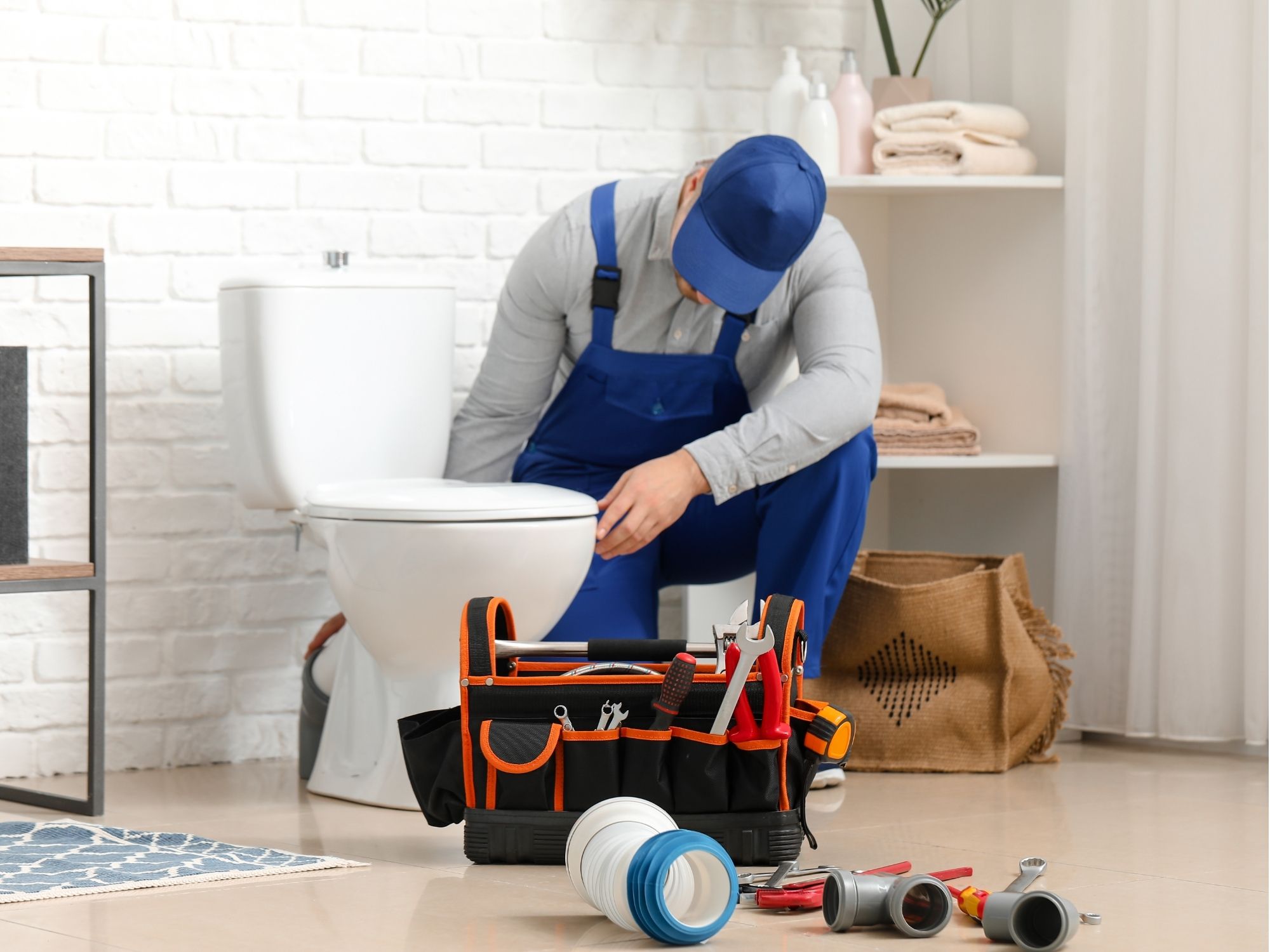 Emergency plumber working on an urgent residential plumbing repair